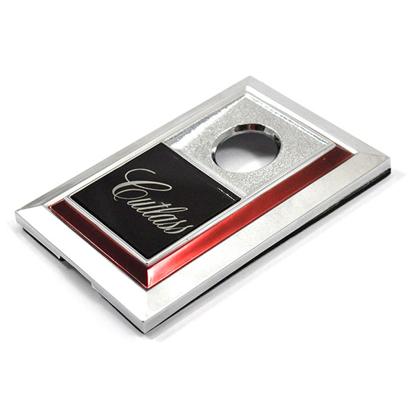 1984 Oldsmobile Cutlass/442/F85 TRUNK LOCK BEZEL EMBLEM (CUTLASS) - EA | EM1806T