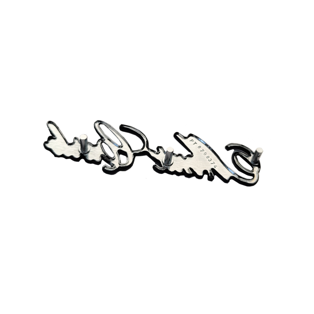 1974 Chevrolet Monte Carlo HEADER PANEL EMBLEM (MONTE CARLO SCRIPT) DOES NOT FIT 74 | EM1668M