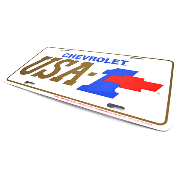 1967 Chevrolet El Camino ACCESSORY LICENSE PLATE (WHITE BACKGROUND WITH CHEVROLET IN BLUE USA-1 IN GOLD & BLUE WITH RED CHEVY BOWTIE) | BK9873Z