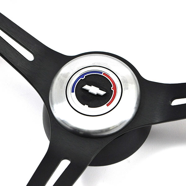 1965 Chevrolet El Camino AFTERMARKET STEERING WHEEL (BLACK LEATHER WHEEL WITH BLACK ANODIZED SPOKES, 14'' OUTSIDE DIAMETER) - INCLUDES: BRUSHED SILVER CHEVY BOWTIE CENTER CAP, FLAT TOP SMALL DIAMETER HUB W/ NOTCH, HORN CONTACT - SOLD AS KIT | ST1006C
