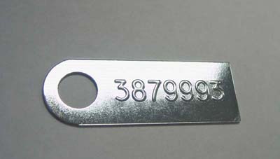 1967 Chevrolet El Camino MANUAL TRANSMISSION TAG (3879993) - FOR L78 EQUIPPED WITH AN M-22.  THE PART NUMBER IS STAMPED FROM THE BACKSIDE; THE RAISED ID NUMBER ON THE FRONT READS 3879993 | MT6104Z