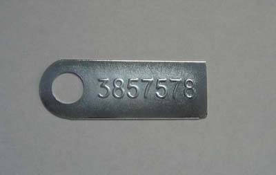 1965 Chevrolet Chevelle/Malibu MANUAL TRANSMISSION TAG (3857578) - FOR Z16 EQUIPPED WITH AN M-20.  THE PART NUMBER IS STAMPED FROM THE BACKSIDE; THE RAISED ID NUMBER ON THE FRONT READS 3857578 | MT9989V
