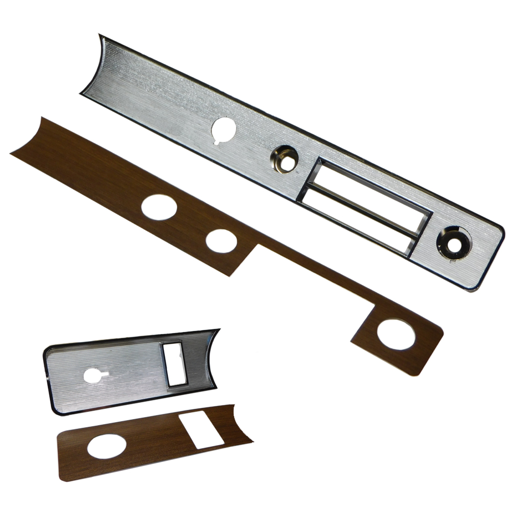 1969 Pontiac GTO/LeMans/Tempest LOWER PLASTIC DASH INSERT SET (2 PIECE) - CORRECT LOWER 2 PIECE DASH CHROME. THIS CHROME FEATURES LOWER CHROME RADIO BEZEL AND WIPER HEADLAMP INSERT. BOTH PIECES INCLUDE PLASTIC INSTALL PINS. THIS LOWER DASH CHROME INCLUDES THE FACTORY WOOD GRAIN. FITS HARDTOP OR CONVERTIBLE | IN3006G